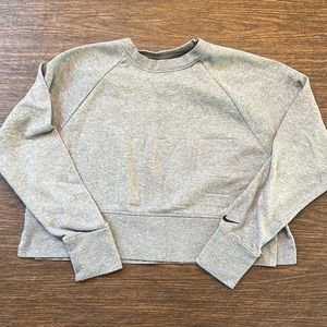 Barley worn. Gray Nike cropped crew neck.